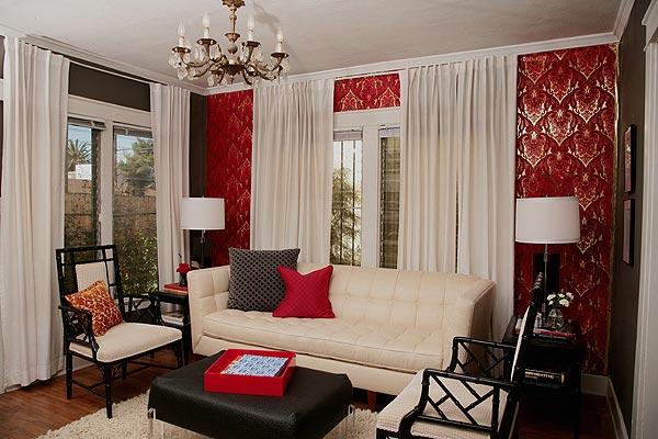 red wallpaper and white drapes, black accents