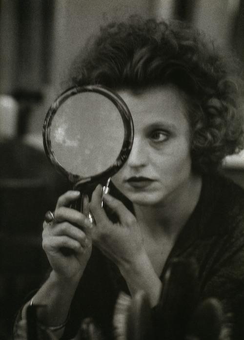 Hannah_Alfred  Hanna Schygulla, the German film star, applying her makeup for a scene in Berlin Alexanderplatz, Munich, 1980
