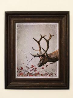 a peaceful elk leaning over some festive red berry branches in an antique vintage style