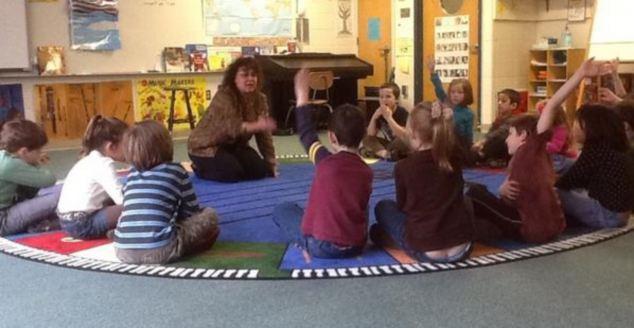 Sandy Hook 1st graders learn about the three As of concert behavior: attention, appreciation, and applause