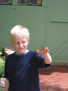 Michael holding a butterfly