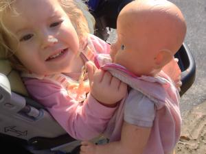 'Mommy' Little Miss Adorable, devoted caregiver to an army of baby dolls