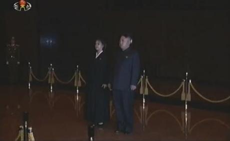 Kim Jong Un (R) and Ri Sol Ju (L) visit KJI's remains (Photo: KCTV/KCNA screengrab)