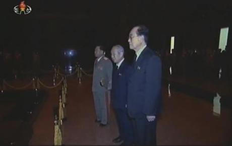 Choe Ryong Hae (1st from the top), Choe Yong Rim (2nd from the top) and Kim Yong Nam (3rd from the top) pay their respects to KJI's body (Photo: KCTV/KCNA screengrabs)