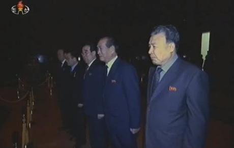 Chief Secretary of the Pyongyang City (municipal) KWP Committee Mun Kyong Dok and senior party officials pay their respects.  Also visible in this image are Kwak Pom Gi, Kim Pyong Hae, Kim Yong Il and Kim Yang Gon (Photo: KCTV/KCNA screengrab)