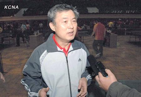 JVIC Chairman Ri Kwang Gun (Ri Kwang-ku'n) gives an interview with DPRK state media after participating in a table tennis tournament at Pyongyang Indoor Stadium in Pyongyang on 19 December 2012 (Photo: KCNA)
