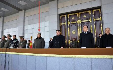 The mystery guest on the platform overlooking Ku'msusan Plaza at a ceremony opening the renovated Ku'msusan Memorial Palace on 17 December 2012.  Also in in attendance are Kim Kyok Sik (L), Hyon Yong Chol (2nd L), Jang Song Taek (3rd L), Choe Ryong Hae (4th L, speaking at a lectern) Kim Jong Un (3rd R) Kim Yong Nam (2nd R) and Choe Yong Rim (R) (Photo: Rodong Sinmun)