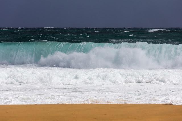 wave breaking on beach