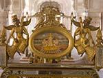 Gold leafed throne with painting on Ganesha in the centre