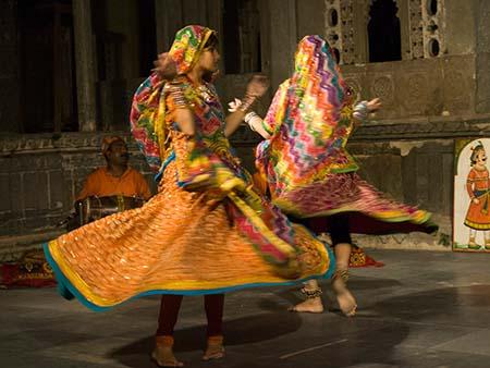 Two girls dancing to traditional Rajasthan folk music