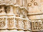 Chipmunk eating on the carvings of Jagdish Temple