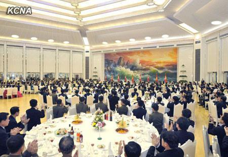 Overview of a 30 December 2012 banquet at Mokran House in central Pyongyang for personnel who contributed to the 12 December 2012 U'nha-3 rocket launch.  It was the second banquet hosted by the Korean Workers' Party Central Committee for those who participated in the launch.  As of 30 December 2012, launch participants had been staying in Pyongyang for two weeks (Photo: KCNA)