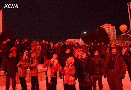 Pyongyang citizens watch a fireworks displays over the skies of the DPRK capital on 1 January 2013.  (KCNA)