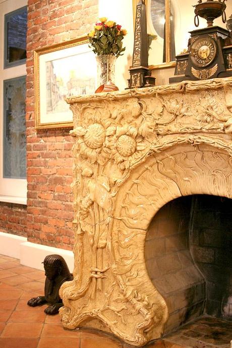 beautiful, ornate stone  fireplace