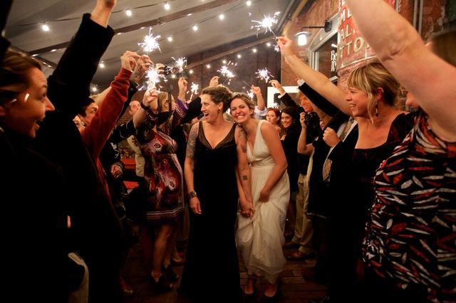 brides leave wedding with sparklers