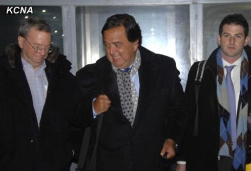 Former New Mexico Governor Bill Richardson (C) smiles after arriving in Pyongyang on 7 January 2013.  Also in this image is Google Executive Chairman Eric Schmidt (L) (Photo: KCNA)