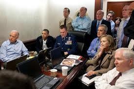infamous photo of President Obama and his cabinet watching the raid on the OBL compound