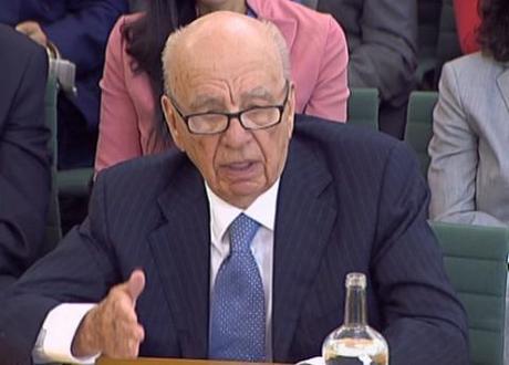 Rupert Murdoch eats humble pie, sustains foam pie attack at select committee hearing