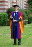 Alex Accepts His Doctorate