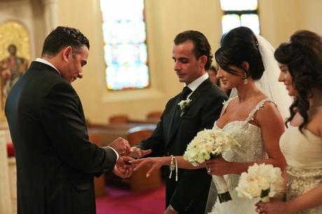 Greek Orthodox wedding bride and groom exchange rings