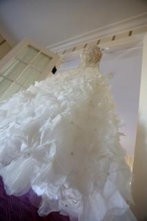 large white wedding dress in doorway