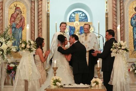 Greek Orthodox wedding bride and groom kiss