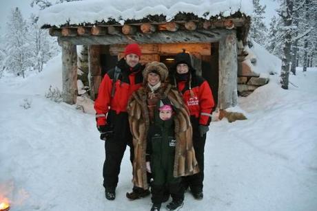 My family and I, standingg with The Blacksmith Elf, outside her little cabin