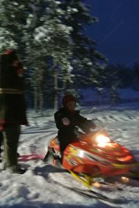 My 5 year old daughter driving a mini-skidoo