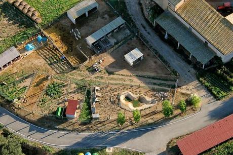 Farm seen while hot air ballooning over Costa Brava, Catalunya, Spain.