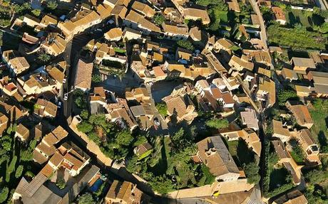 Hot air ballooning over a medieval village in Costa Brava, Catalunya, Spain