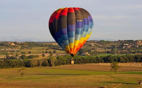 Hot air ballooning over Costa Brava, Catalunya, Spain with the Pyrenees in the north.