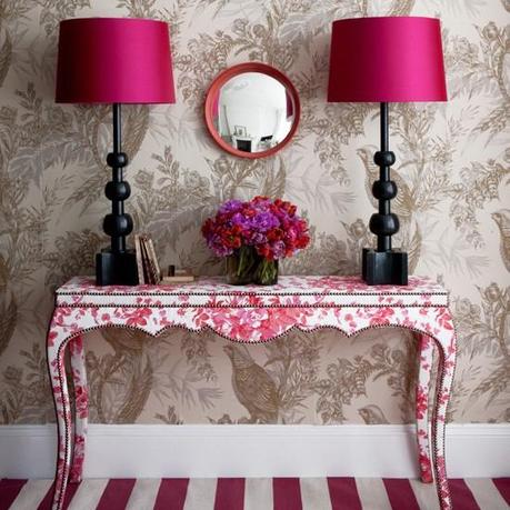 toile console, fuchsia lampshades and striped rug in ana entryway