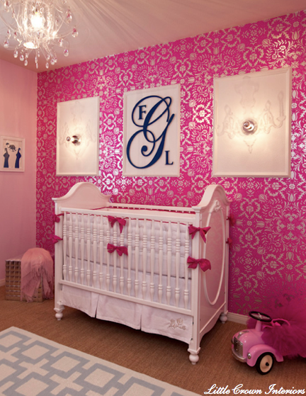fuchsia and silver damask wallpaper in a girl's nursery
