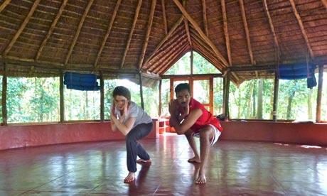 Anna Stothard with Omesh kalari yoga instructor kerala