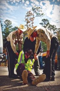 PHOTOS BY TAR SANDS BLOCKADE / LAURABOREALISA protester is arrested outside Wells, Texas.