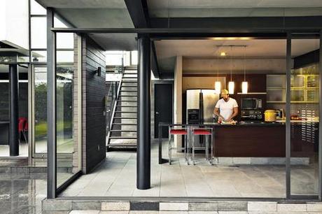 Modern kitchen with granite island and Porcelanosa cabinets