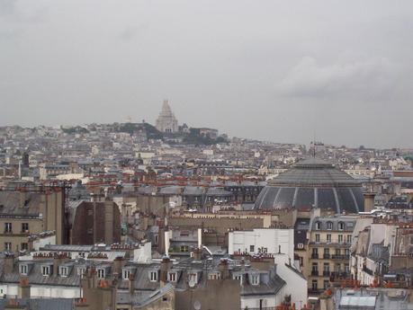 Sacre Coeur atop hill in Montmartre - Paris