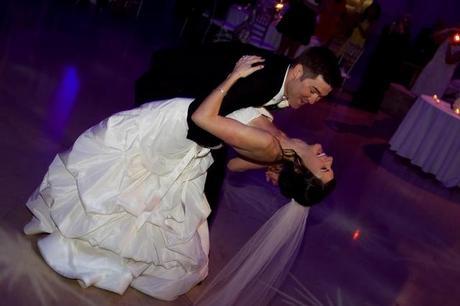 groom dipping bride during dance