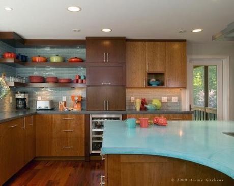 Cabinets with a similar finish to ours, paired with a really cool turquoise formica and tile backsplash. 