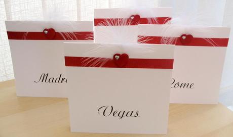 wedding table names in red and white