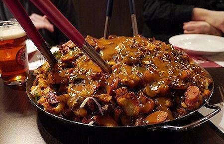 Poutineville's Heart Attack Poutine Is The Queen Of All Poutines