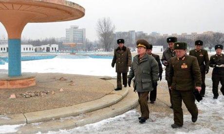 VMar Choe Ryong Hae (L) tours the construction of the Munsu Wading Pool in Pyongyang (Photo: Rodong Sinmun)