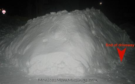 The snowbank at the end of our driveway. 5 1/2 feet tall and about 15 feet wide. It goes 10 feet into the road.