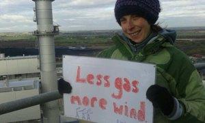 A climate protestor atop West Burton gas power station