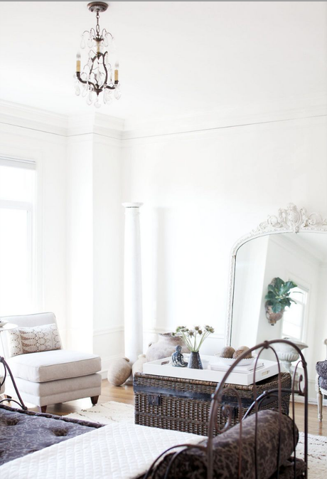An elegant home in white and beautiful antiques.