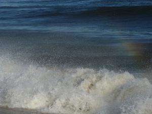 Rainbow in the Waves, photo Susan Katz Miller