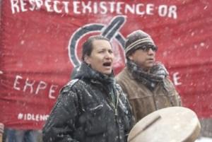 Klee Benally leads the drum circle during an Arizona Snowbowl protest, the protest took place at heritage square in downtown Flagstaff on Saturday. Arizona Snowbowl has been using reclaimed water to blow snow onto the mountain which started in December of last year. (Photo by Jeff Bucher)