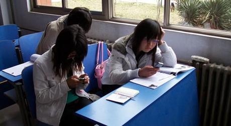 Using Technology to Build an Interactive Classroom students-using-smartphones
