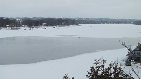 Ottawa River - frozen with fish huts on it - Canada