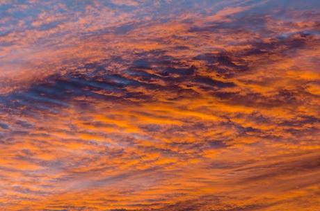 red sunrise on clouds